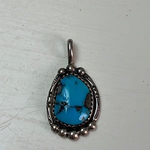 Pd10. Sterling Silver and turquoise pendant.